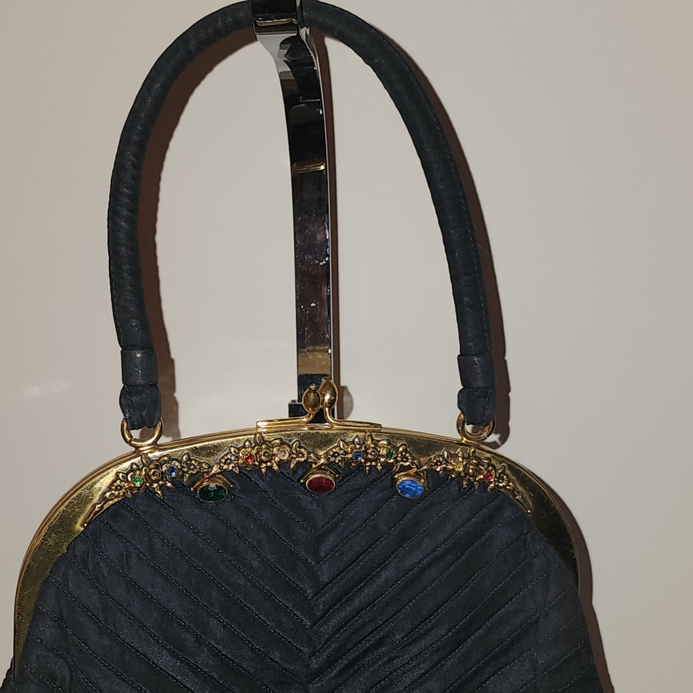 Elegant Black and Gold Clutch with Jewel Embellishments